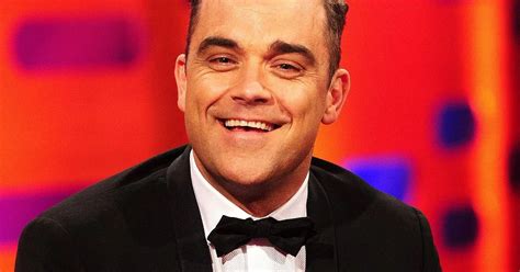 Robbie Williams gay: Singer reveals he is 49 per cent。